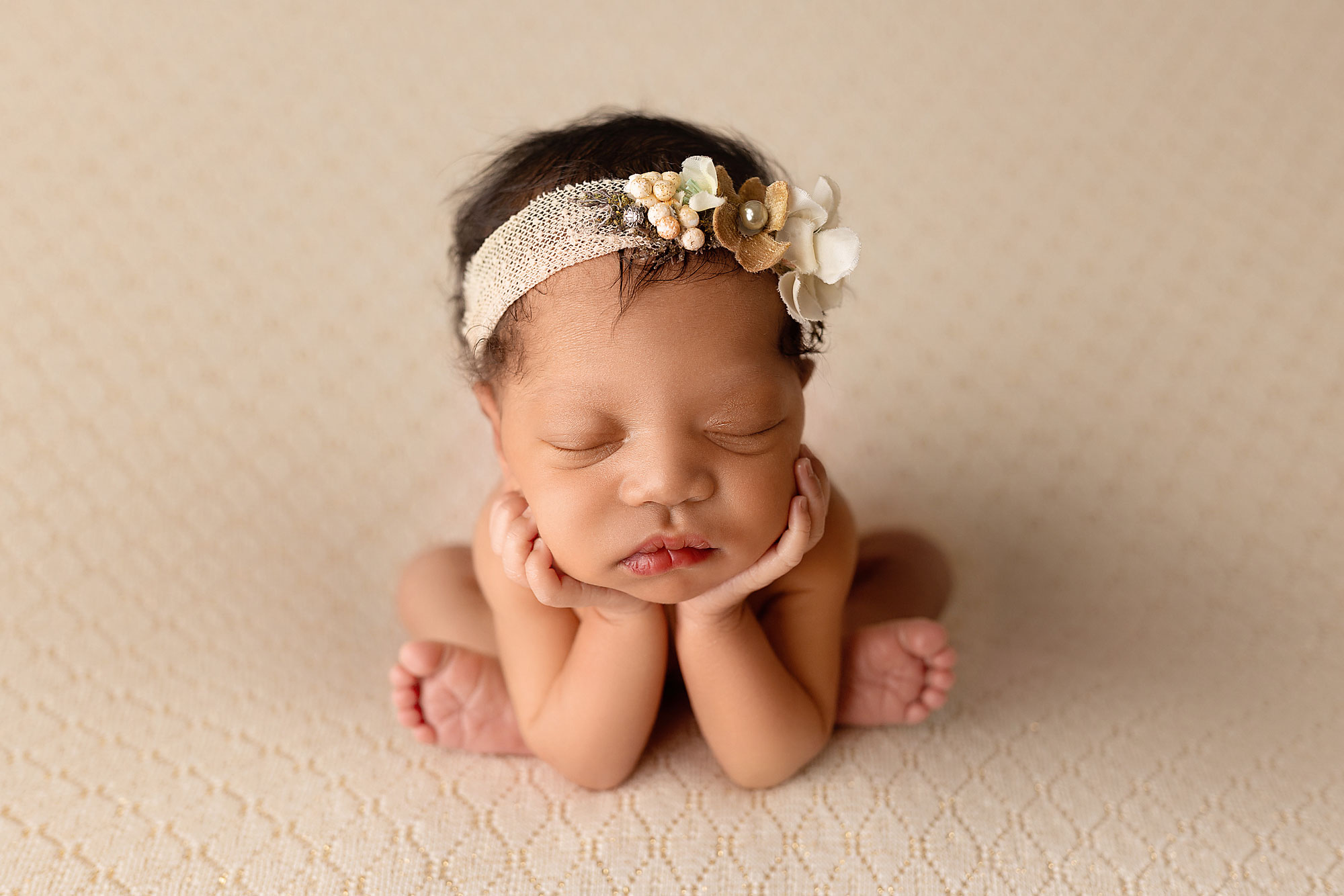 newborn baby in a froggy pose