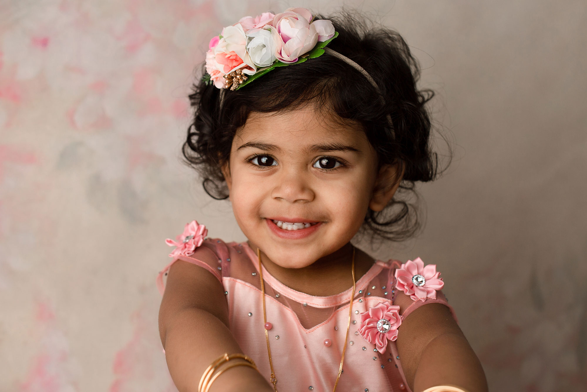 little girl smiling for photos during her session hudson county nj