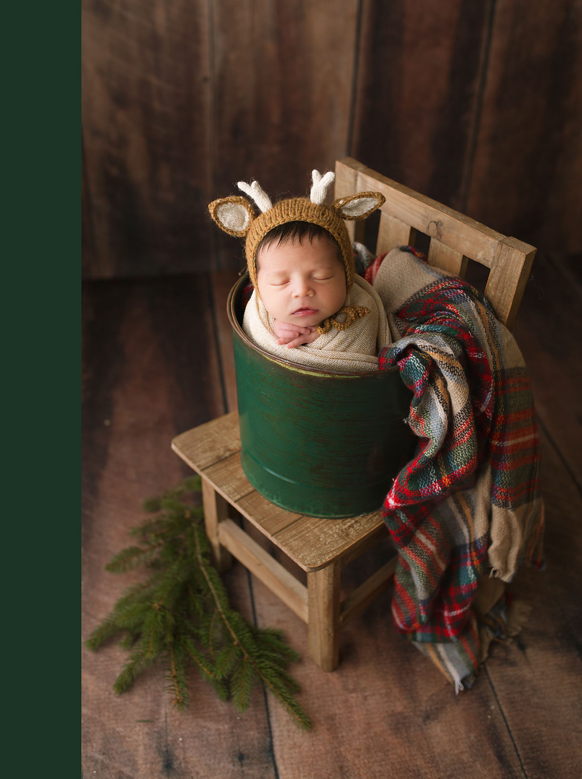 chistmas set up newborn baby girl in a bucket v