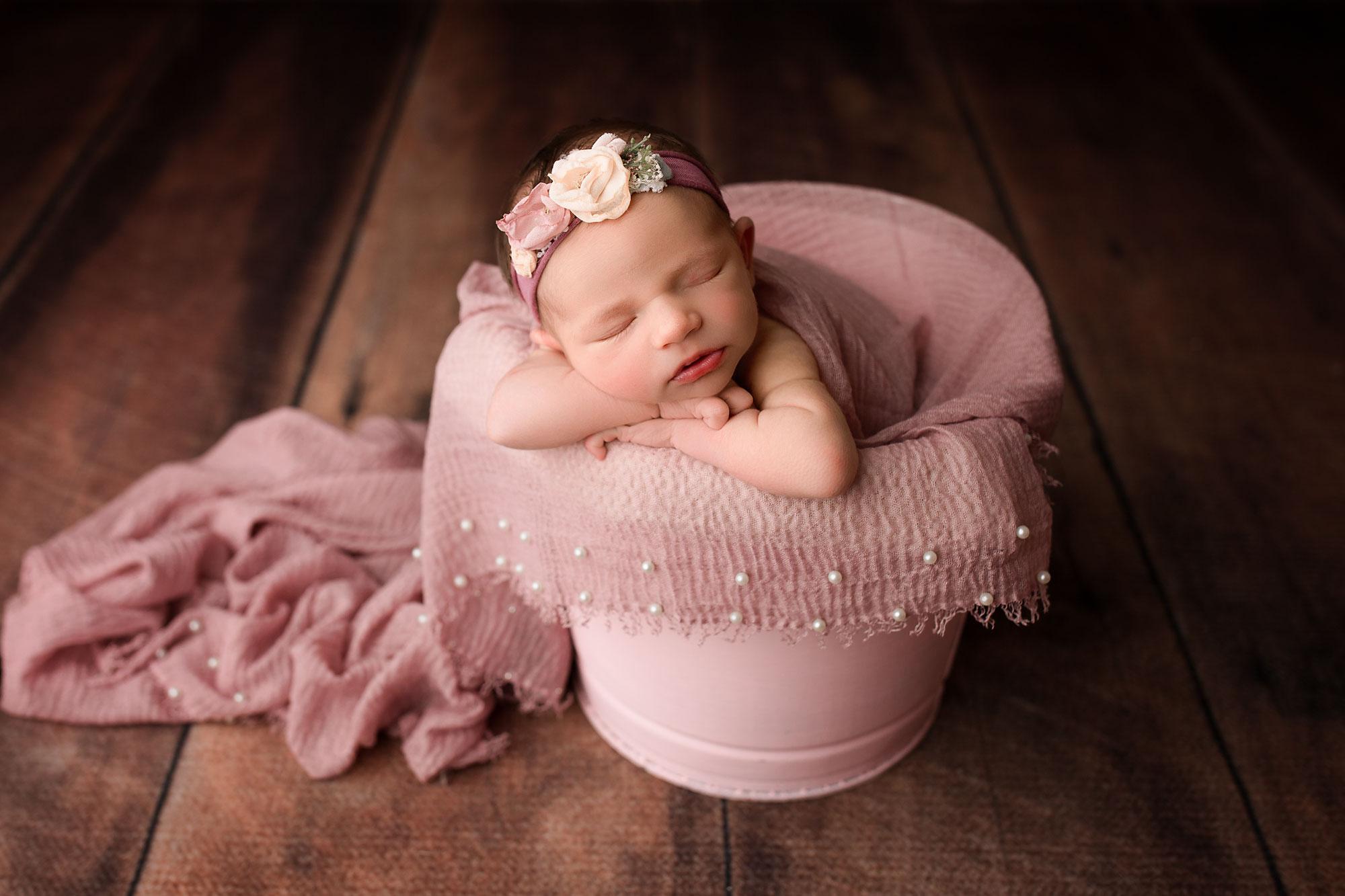 baby girl sleeping in a bucket newborn photographer nj morris county baby photographer