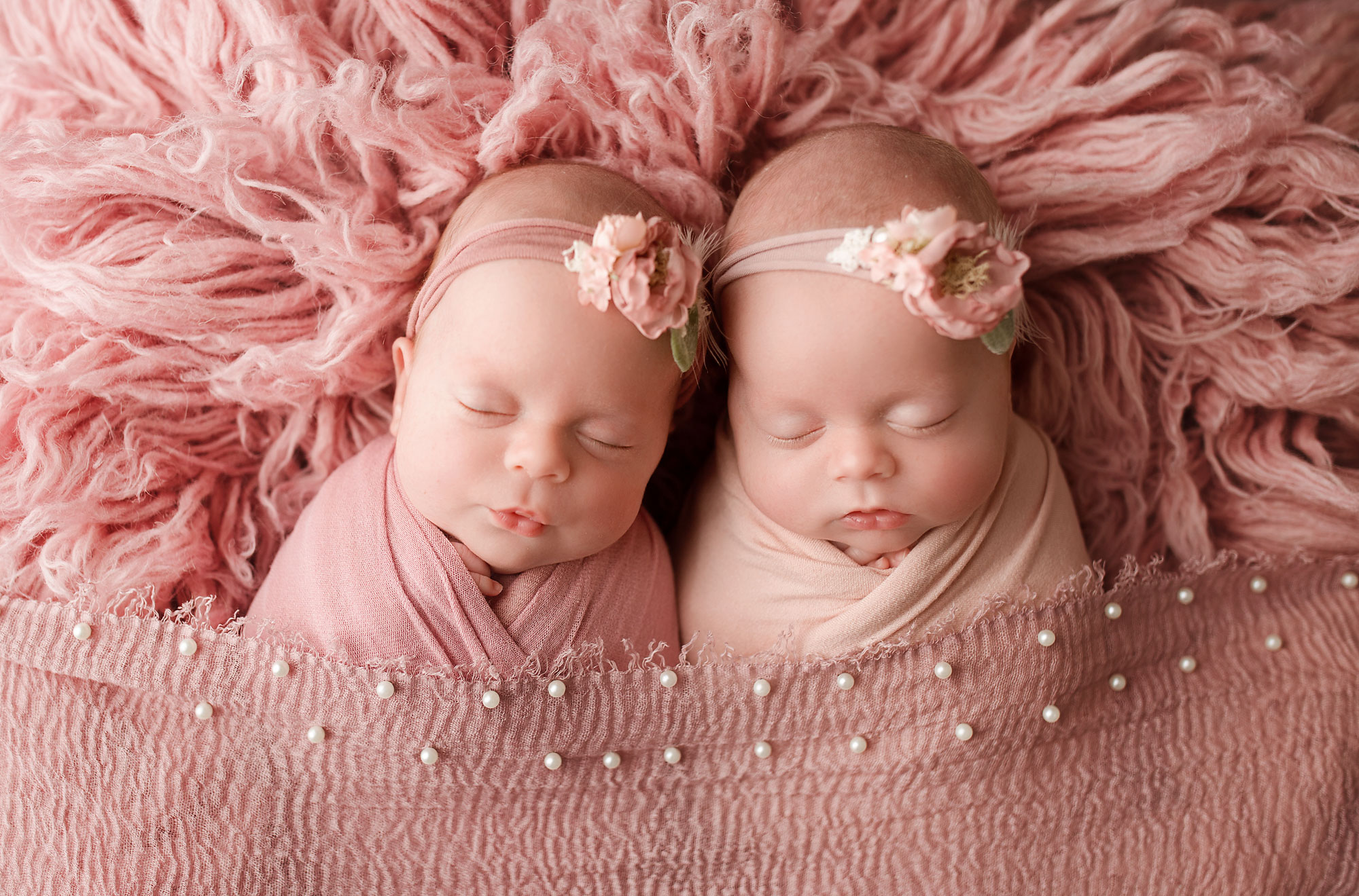 baby twins photography somerset county newborn photographer baby girls sleeping swaddled on a blanket