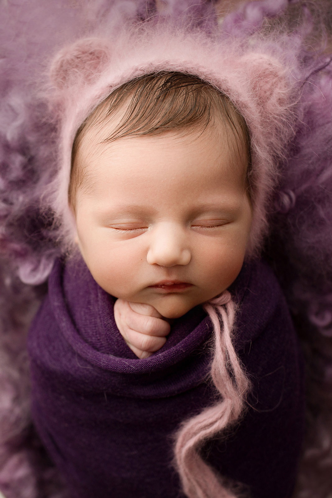baby girl in purple bonnet baby photo session flemington nj