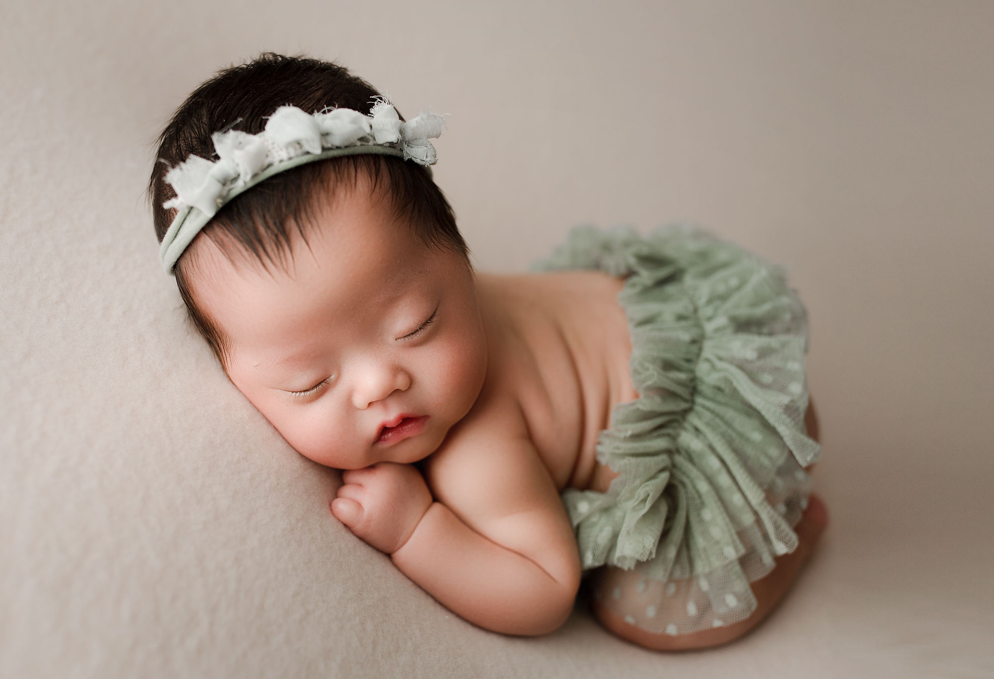 sleeping baby girl with a tutu Bergen County NJ Newborn Photography