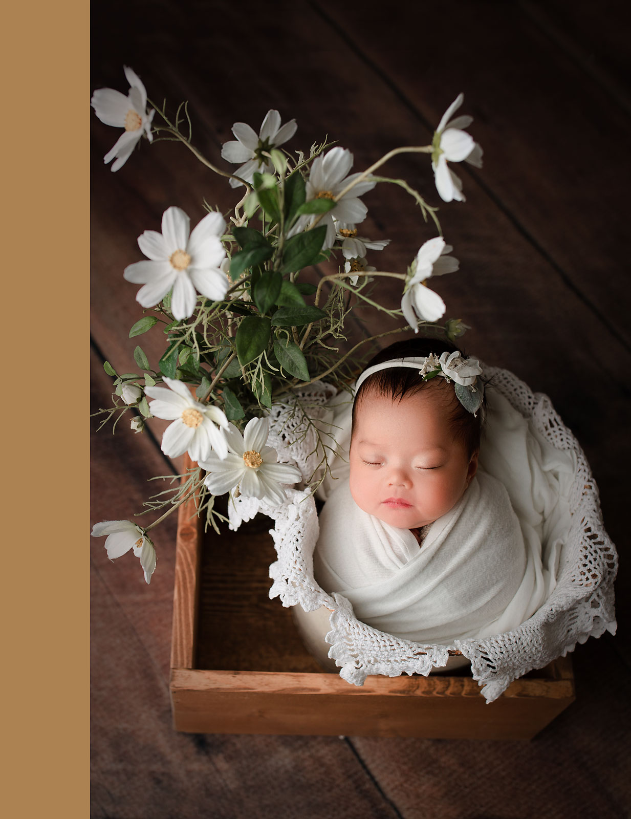 newborn girl sleeping in a bucket with flowers Bergen County NJ Newborn Photography 