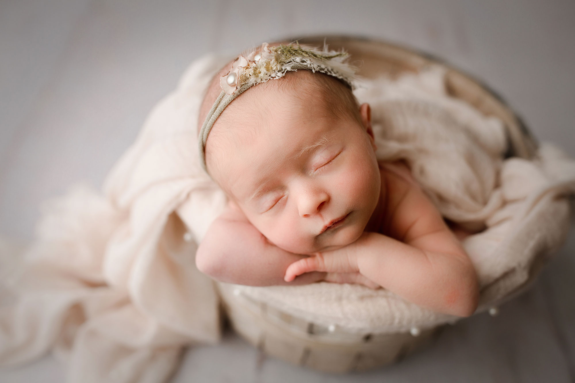 newborn baby sleeping in a bucket Readington NJ newborn photo session