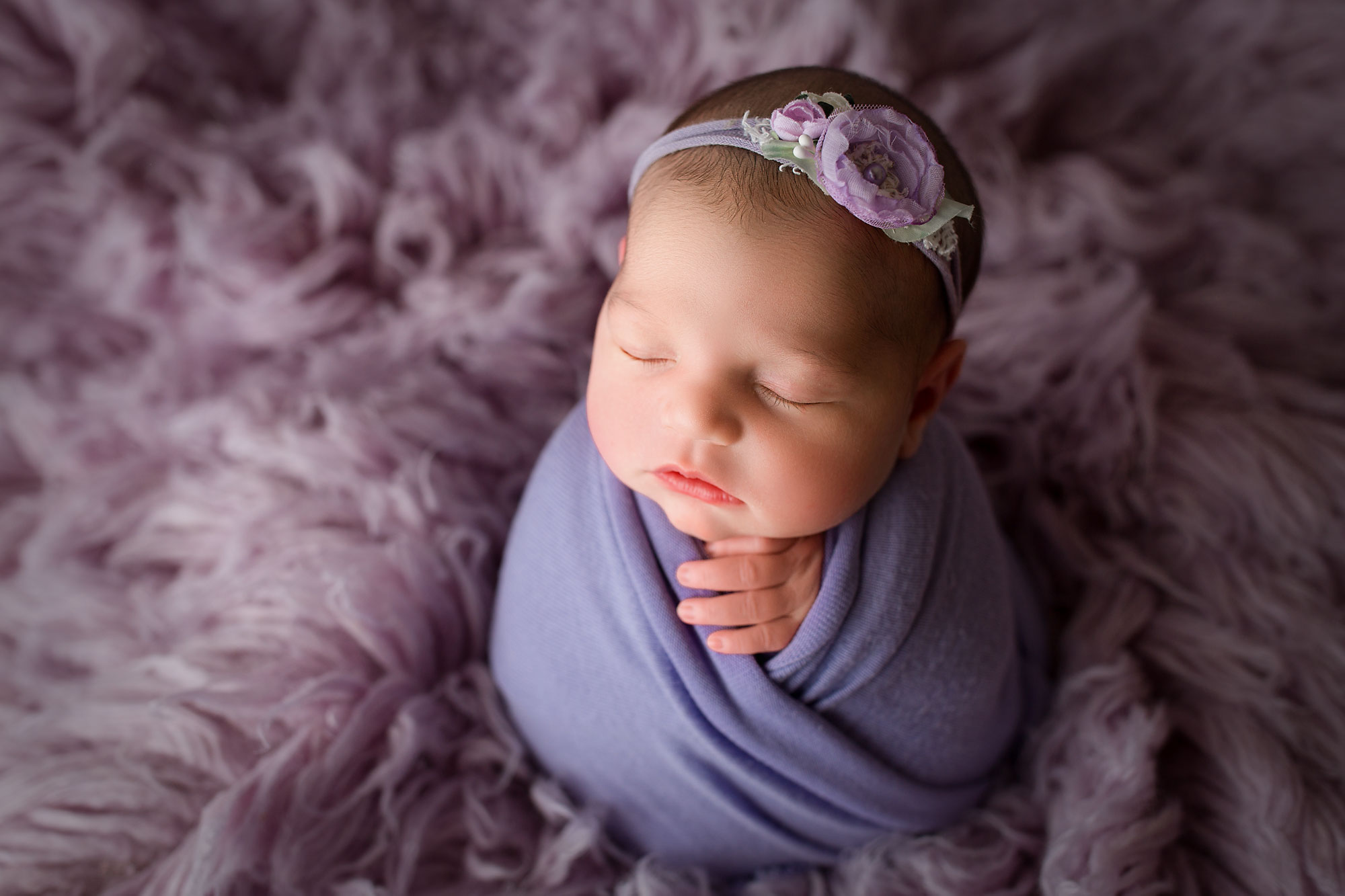 baby girl on a purple flokati Hunterdon county NJ baby photography session 