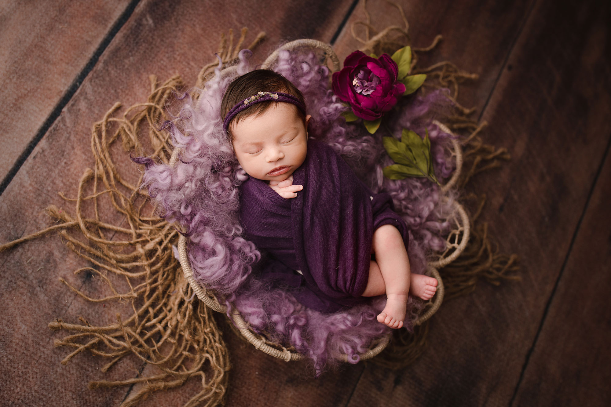 central nj newborn photography baby in a purple set up