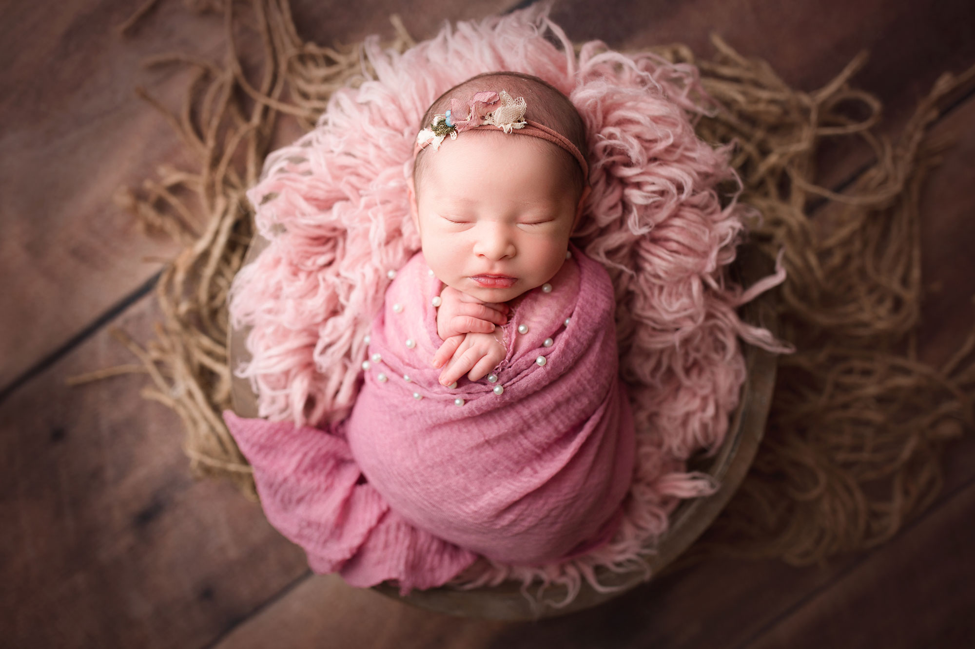 baby girl in pink newborn session long valley nj
