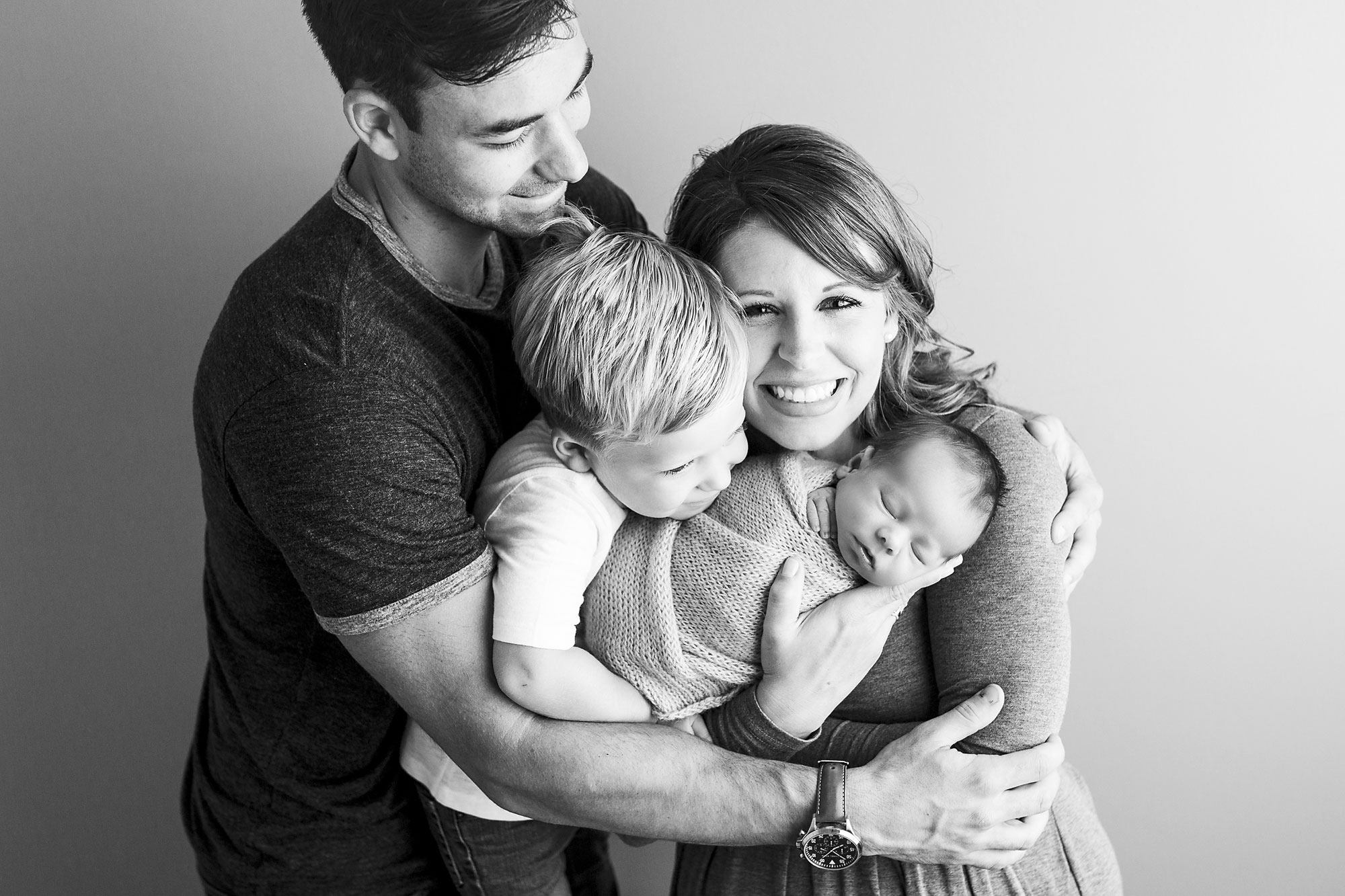 newborn and family photographer nj, black and white of parents big brother and newborn baby