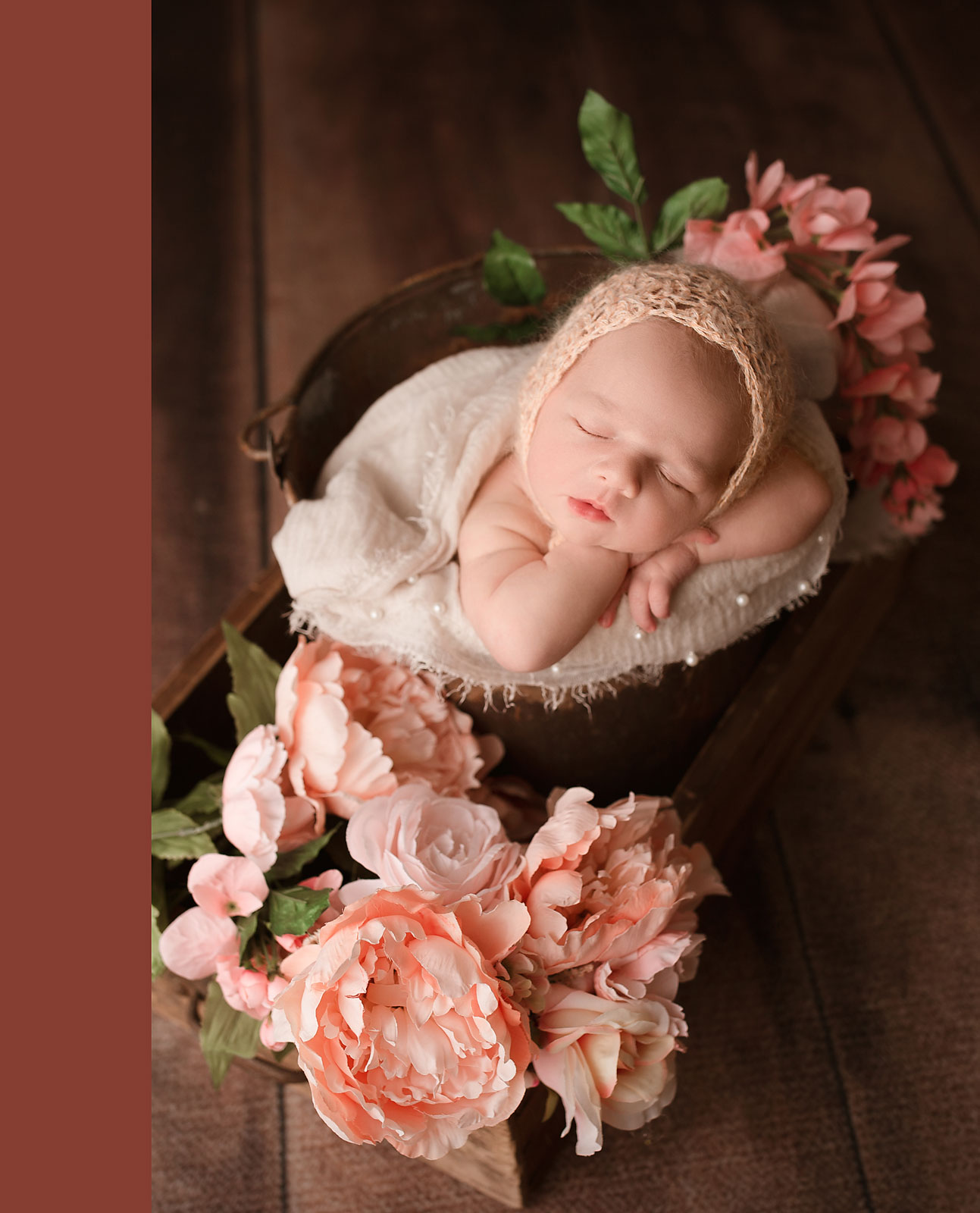 newborn photo shoot hunterdon county nj, baby girl asleep in rustic bucket surrounded by flowers