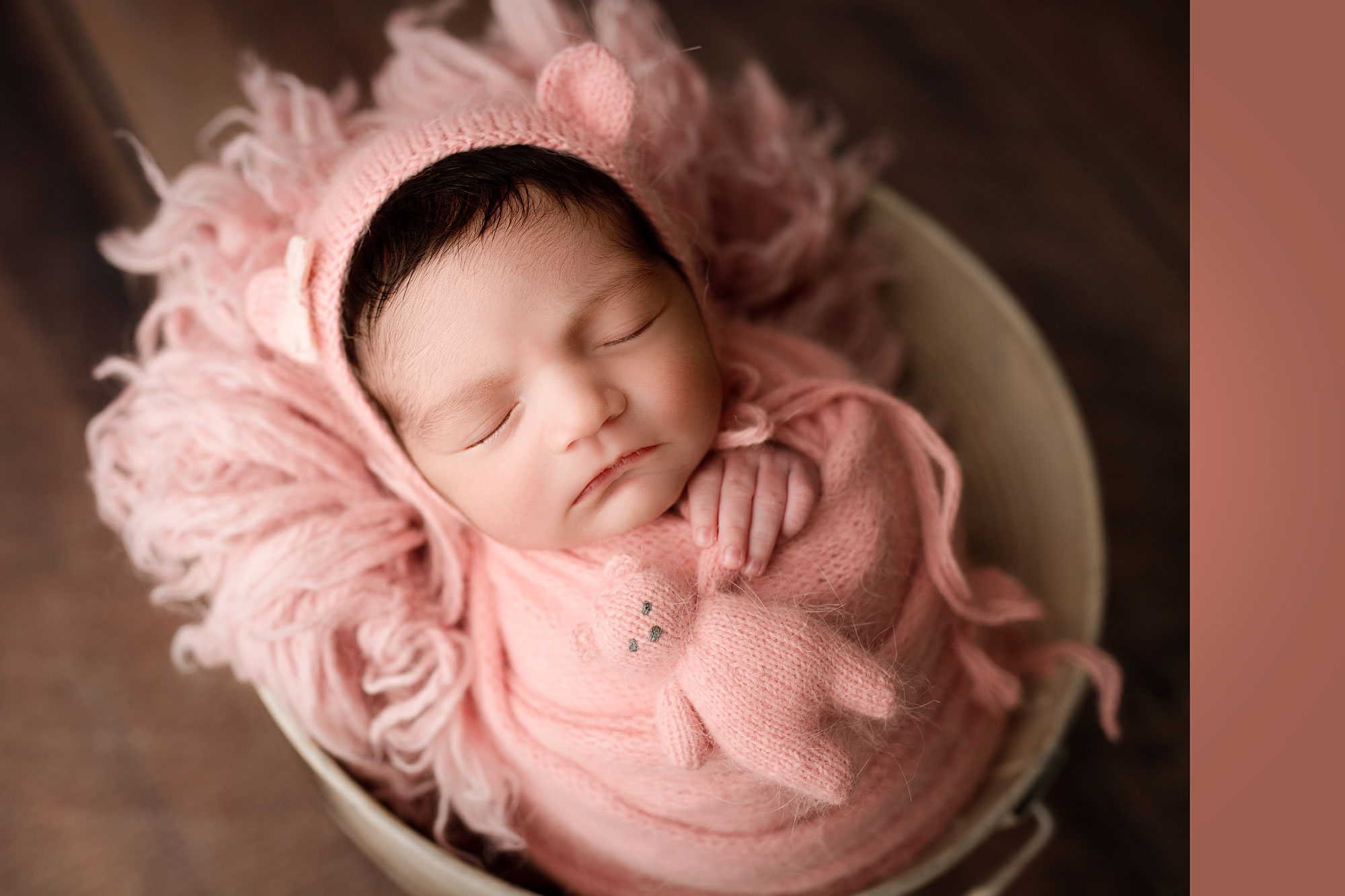 baby girl newborn photographer NJ, baby girl with pink teddy and bear hat sleeping in bucket