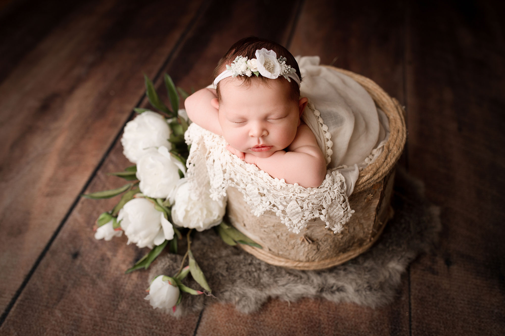 union county nj newborn photographer, baby girl asleep in rustic setup with lace blanket and white flowers