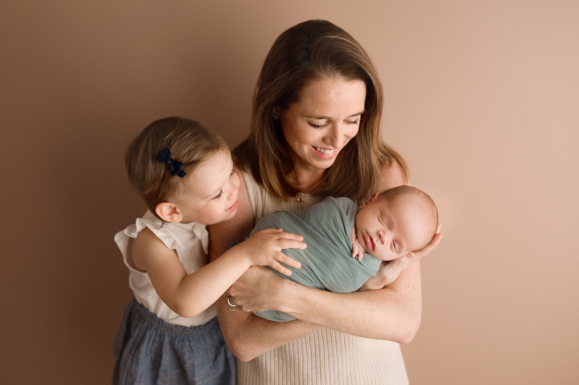 newborn and family pictures new jersey, mom and little girl holding new baby boy