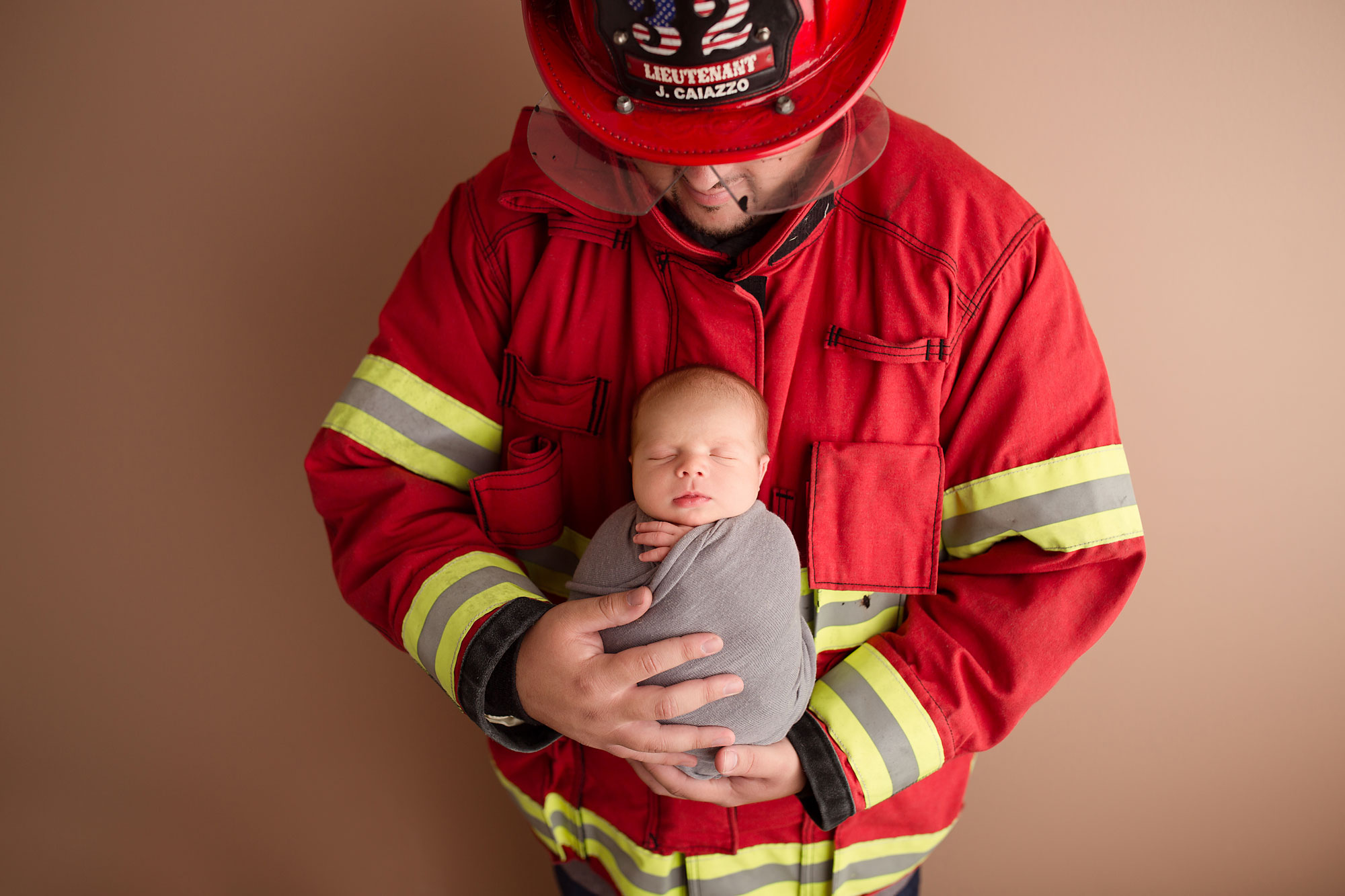 newborn firefighter photography ideas 