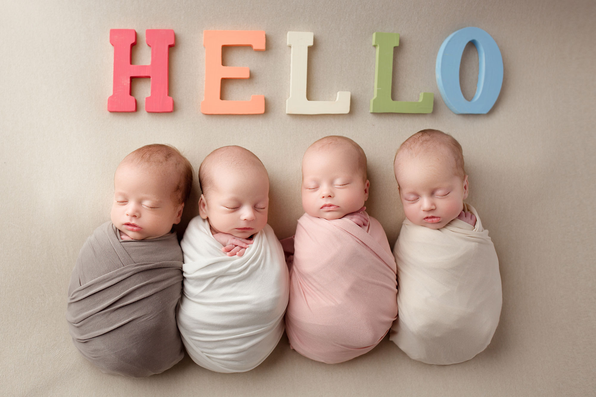 quadruplets newborn rainbow babies 
