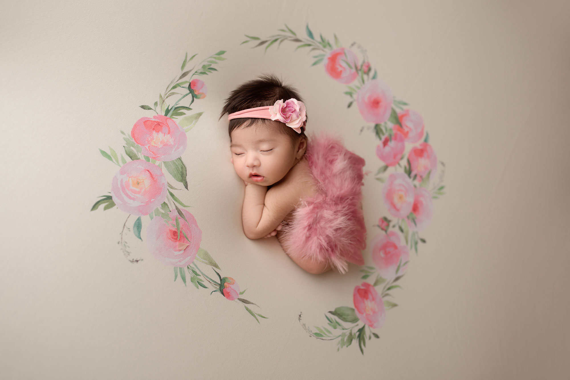 baby girl photo shoot nj, baby in pink asleep on floral print
