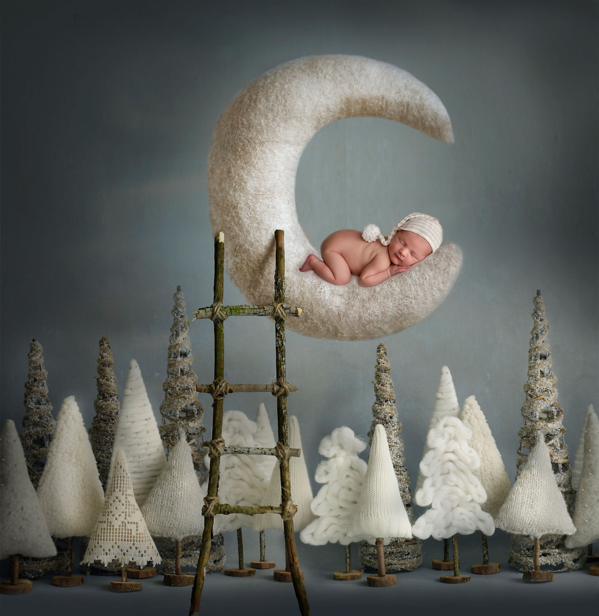 newborn photo ideas for photography session baby on the moon