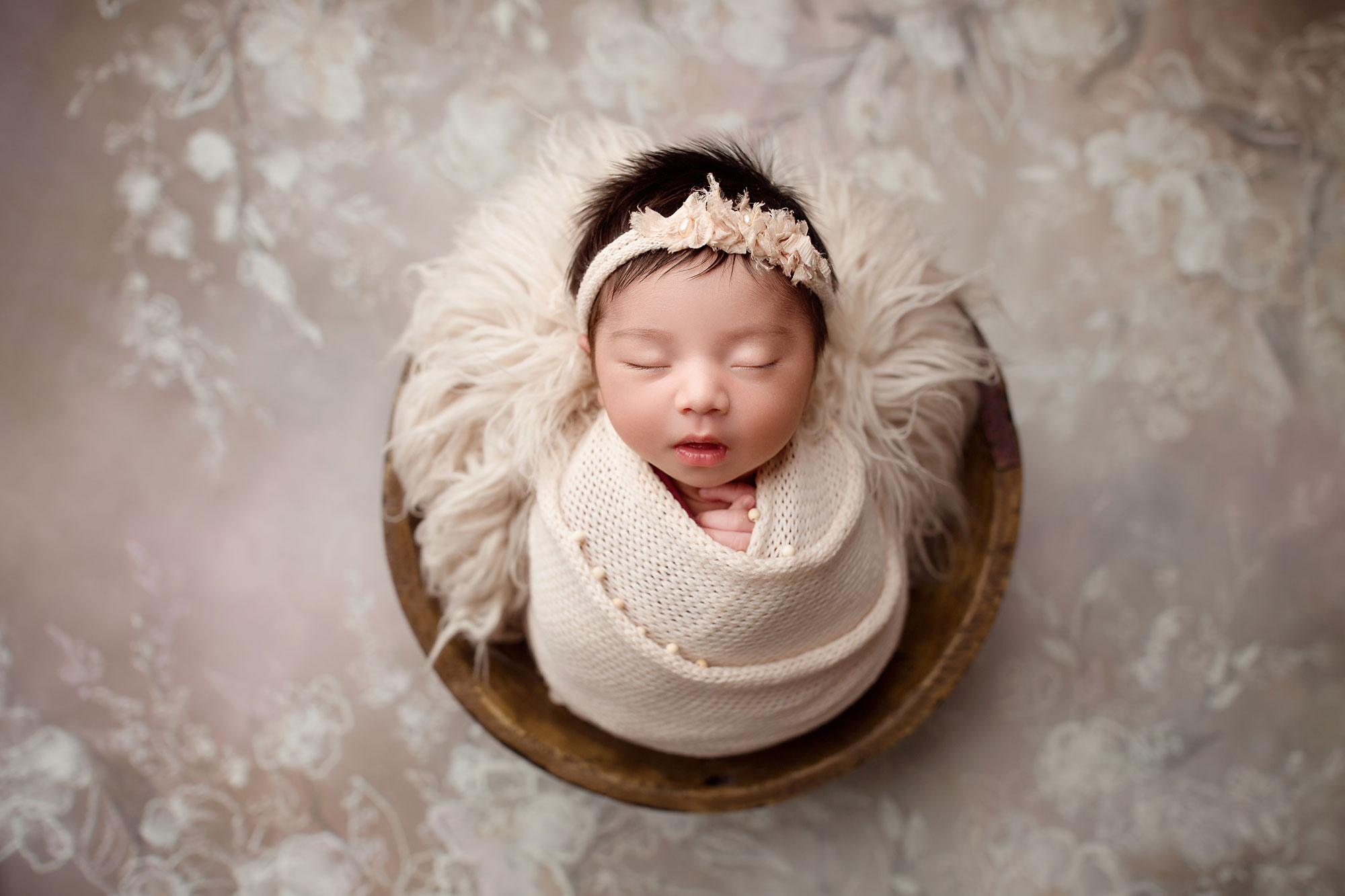top nj newborn baby photographer baby sleeping in a bowl 
