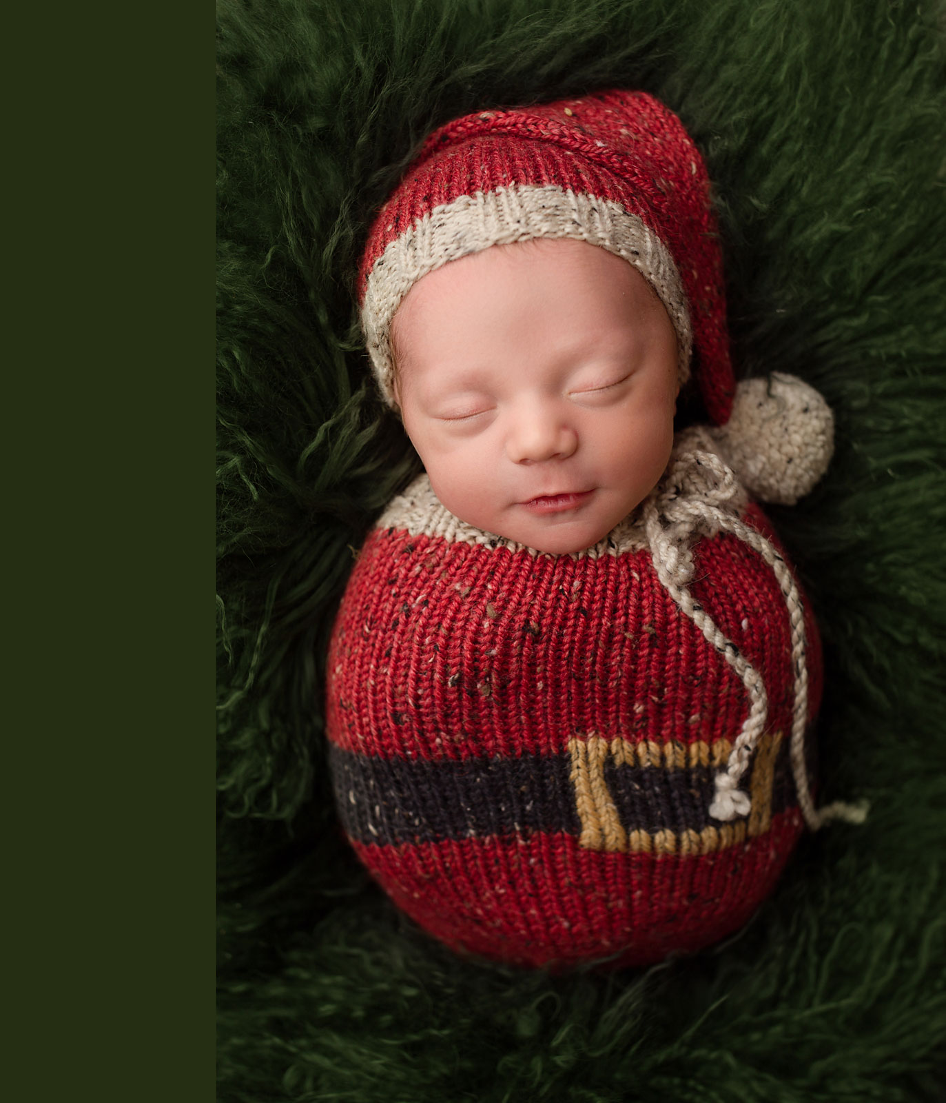 newborn baby dressed like a santa