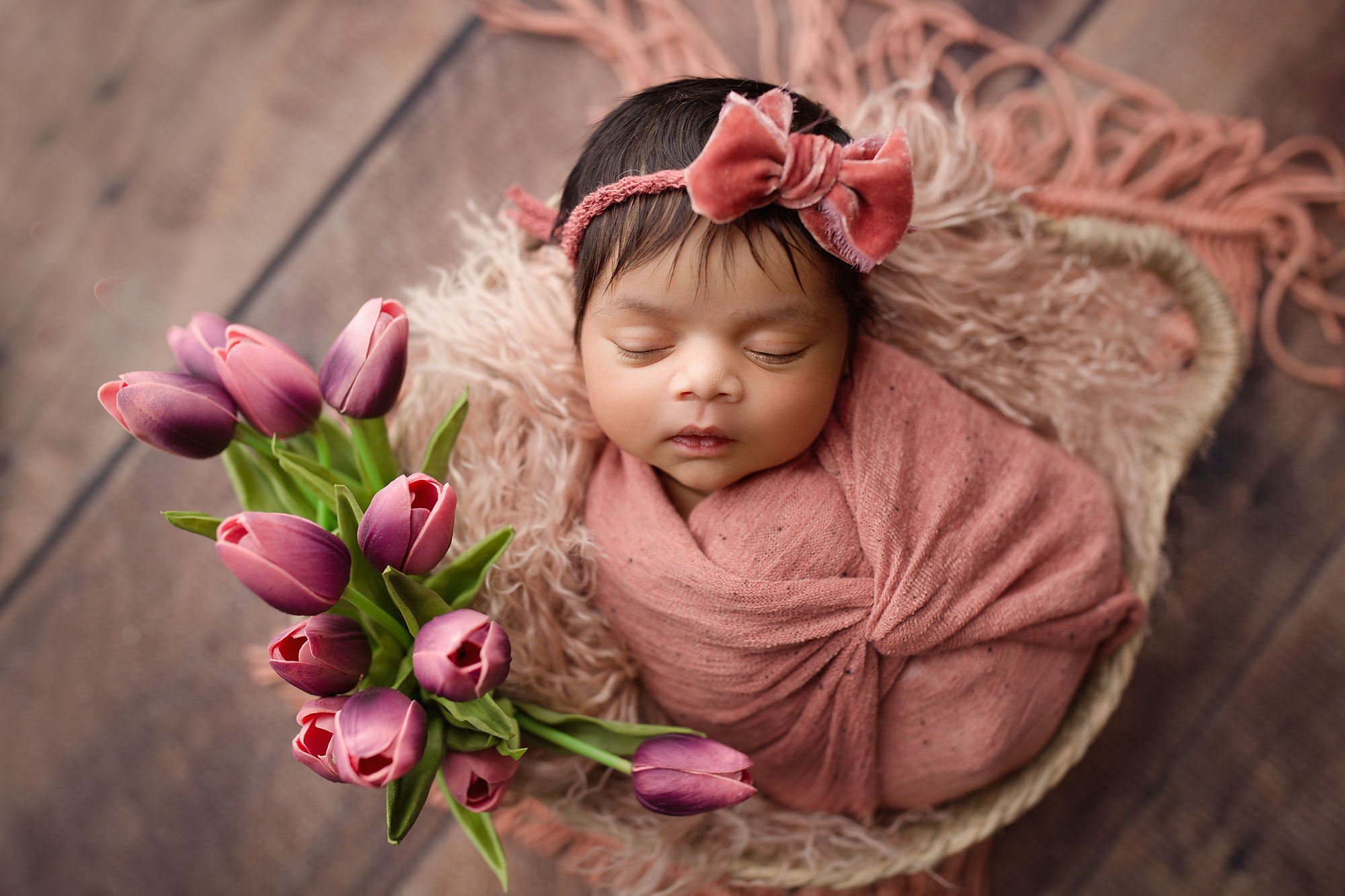 baby girl sleeping in a basket NJ newborn photography 