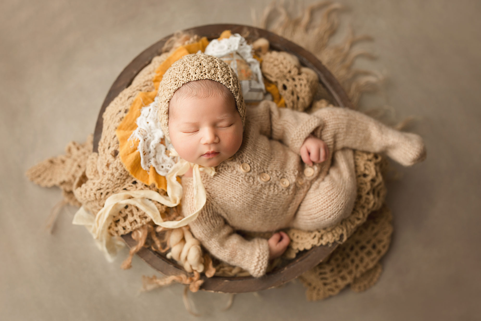 newborn baby in a basket photographed by top NJ baby photographer