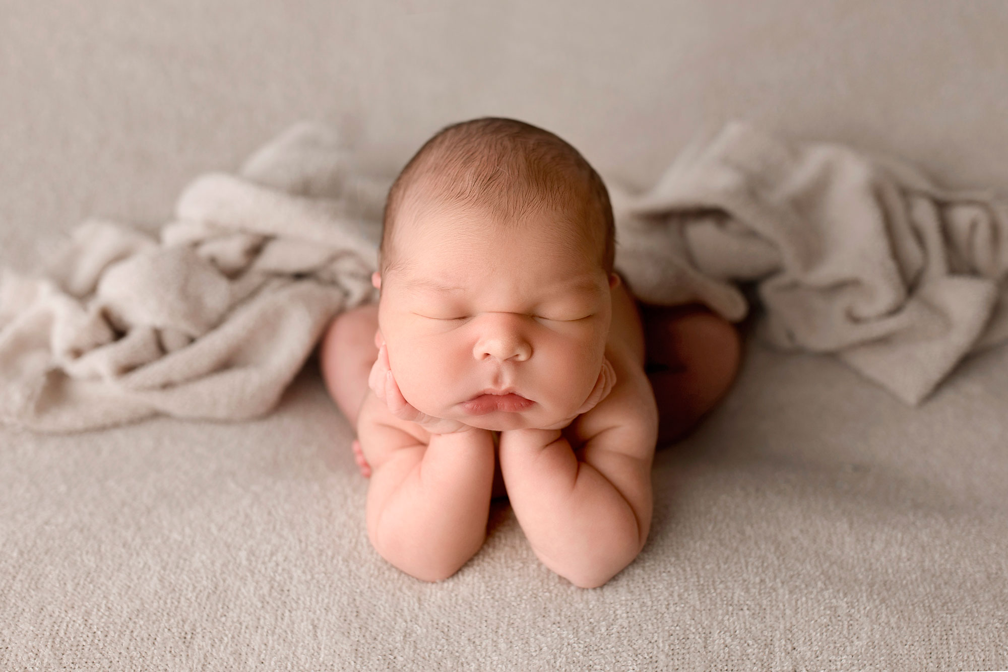 nj newborn photos showing a baby boy 